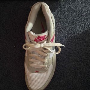 nike air max. they are white and grey,nike sign is silver,and some parts pink